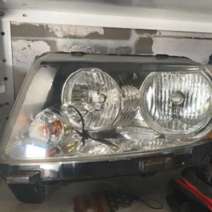 Фара Jeep Compass 2011-2016 чорна ліва 68171215AB 68185341AB