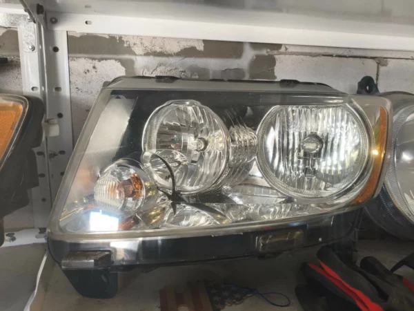 Фара Jeep Compass 2011-2016 ліва хром 68171215AB 68185341AB