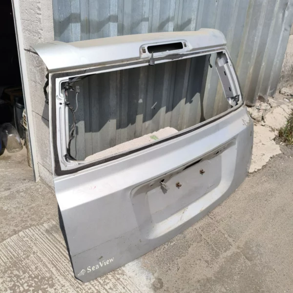 ff-17193-kryshka-bahazhnyka-jeep-patriot-2007-2017-sira-zadnia-liada Кришка багажника Jeep Patriot 2007-2017 сіра задня ляда