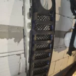 Оригінальна решітка радіатора взборі Jeep Patriot 2007-2017 68091527AA