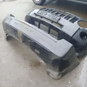 Передній бампер Jeep Patriot 2007-2010 взборі 68021312AA 68091521AA